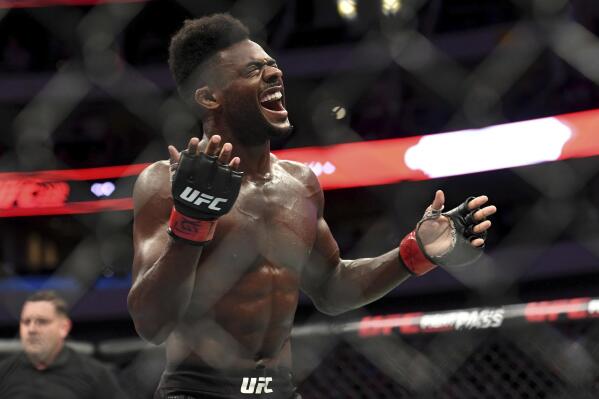 FILE - Aljamain Sterling celebrates after defeating Cody Stamann in their bantamweight mixed martial arts bout at UFC 228 on Saturday, Sept. 8, 2018, in Dallas. Former two-division world champion Henry Cejudo fights for the bantamweight title bout against reigning champion Aljamain Sterling. The are the main event of UFC 288 on Saturday at the Prudential Center in Newark, N.J. (AP Photo/Jeffrey McWhorter, File)