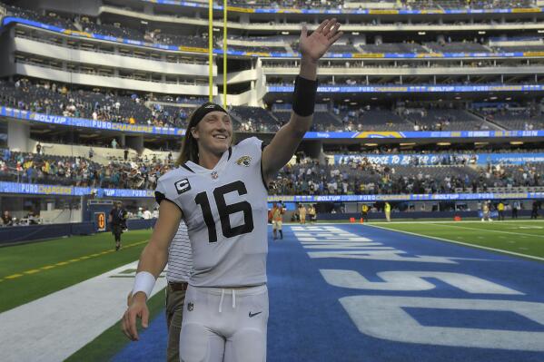 Jacksonville Jaguars quarterback Trevor Lawrence (16) waves after an NFL football game against the Los Angeles Chargers in Inglewood, Calif., Sunday, Sept. 25, 2022. (AP Photo/Mark J. Terrill)