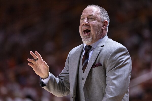 Texas A&M head coach Buzz Williams yells to his players during the first half of an NCAA college basketball game against Tennessee, Saturday, Feb. 24, 2024, in Knoxville, Tenn. (AP Photo/Wade Payne)