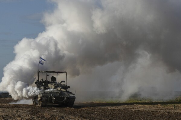 An Israeli army tank moves near the Gaza Strip border in southern Israel on Wednesday, Jan. 24, 2024.  (AP Photo/Tsafir Abayov)