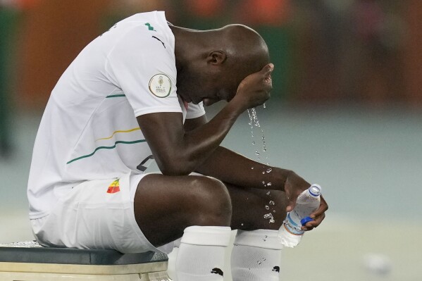 Guinea's Antoine Conte reacts at the end of the African Cup of Nations quarter final soccer match between DR Congo and Guinea, at the Olympic Stadium of Ebimpe in Abidjan, Ivory Coast, Friday, Feb. 2, 2024. (APPhoto/Themba Hadebe)