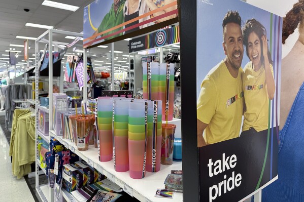 FILE - Pride month merchandise is displayed at a Target store, May 24, 2023, in Nashville, Tenn. Target confirmed that it won't be carrying its LGBTQ+ merchandise for Pride month in June, 2024, in some stores after the discount retailer received backlash last year for its assortment. (AP Photo/George Walker IV, File)