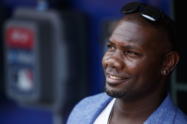 Former Philadelphia Phillies' Ryan Howard smiles before a ceremony honoring him before a baseball game between the Phillies and the Washington Nationals, July 14, 2019, in Philadelphia. (AP Photo/Matt Slocum, file)