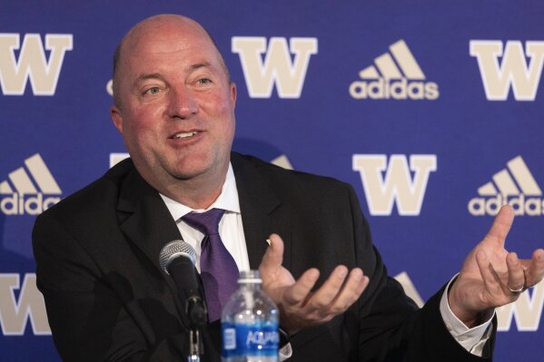 FILE - University of Washington's new Athletic Director Troy Dannen meets with media during a news conference, Tuesday, Oct. 10, 2023, in Seattle. Athletic director Troy Dannen is leaving Washington after less than six months on the job, a school spokesman said Wednesday, March 20, 2024, and a person with knowledge of the decision told The Associated Press he is heading to Nebraska to replace Trev Alberts. (Ken Lambert/The Seattle Times via AP, File)