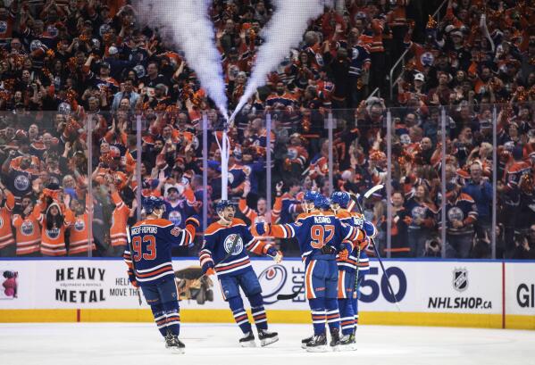 Edmonton Oilers' Ryan Nugent-Hopkins at home on Connor McDavid's wing