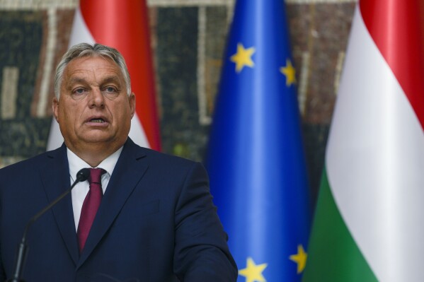 FILE - Hungarian Prime Minister Viktor Orban speaks during a press conference after talks with Serbian President Aleksandar Vucic at the Serbia Palace in Belgrade, Serbia, Friday, Sept. 29, 2023. Orban will be the center of attention at an EU summit Thursday, Oct. 26, 2023 following his meeting with Russian President Vladimir Putin last week. Diplomats say EU leaders will directly confront him with accusations he broke EU unity in their support of Ukraine. (AP Photo/Darko Vojinovic, File)