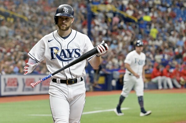 Nola beats former teammate Eflin as the Phillies beat AL-leading Rays 3-1  for 10th straight road win