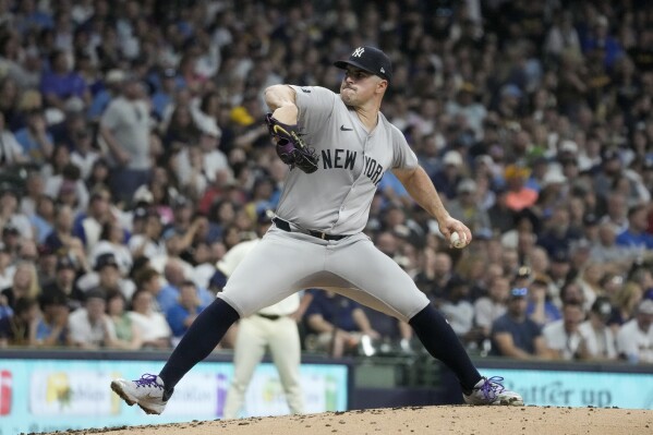 New York Yankees pitcher Carlos Rodón throws during the first inning of a baseball game against the Milwaukee Brewers Saturday, April 27, 2024, in Milwaukee. (AP Photo/Morry Gash)