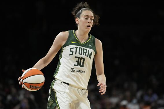 FILE - Seattle Storm forward Breanna Stewart brings the ball up against the Las Vegas Aces in Game 2 of a WNBA basketball playoff semifinal Aug. 31, 2022, in Las Vegas.Stewart is the biggest WNBA free agent on the market this offseason and the former MVP has a host of teams courting her, including the Storm, where she's spent her entire career. (AP Photo/John Locher, File)