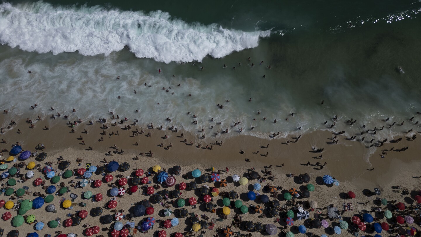 Rio de Janeiro’s freshest day in no less than a decade sends citizens to the seaside