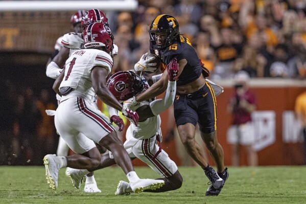 Tennessee receiver Bru McCoy has surgery to repair a displaced fracture of  his right ankle