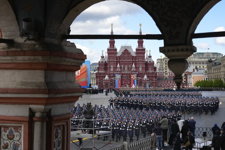 Russian soldiers march during the Victory Day military parade dress rehearsal at the Red Square in Moscow, Russia, Sunday, May 5, 2024. The parade will take place at Moscow's Red Square on May 9 to celebrate 79 years of the victory in WWII. (AP Photo/Alexander Zemlianichenko)