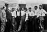 In this May 1, 1935 file photo, attorney Samuel Leibowitz from New York, second left, meets with seven of the Scottsboro defendants at the jail in Scottsboro, Ala. just after he asked the governor to pardon the nine youths held in the case. From left are Deputy Sheriff Charles McComb, Leibowitz, and defendants, Roy Wright, Olen Montgomery, Ozie Powell, Willie Robertson, Eugene Williams, Charlie Weems, and Andy Wright. The black youths were charged with an attack on two white women on March 25, 1931. (AP Photo)