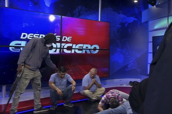 Ecuador's escalating gang violence is broadcast are living to the country as masked gunmen hurricane TV studio