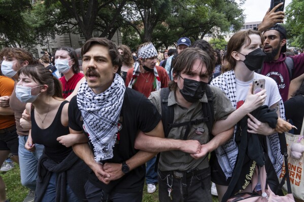 Protesters chant during a pro-Palestinian demonstration at the University of Texas, Wednesday, April 24, 2024, in Austin, Texas.  (Mikala Compton/Austin American-Statesman via AP)