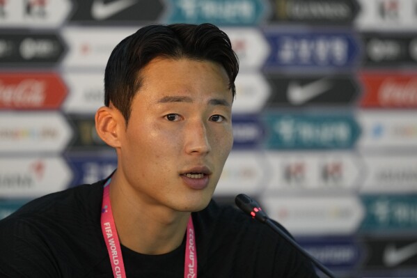 FILE - South Korea's Son Jun-ho speaks during a press conference before a training session at Al Egla Training Site 5 in Doha, Qatar, Nov. 22, 2022. Son Jun-ho, a star South Korean soccer player who was detained and investigated in China for nearly a year over bribery allegations has been released and returned home, Seoul’s Foreign Ministry said Monday March 25, 2024. (AP Photo/Lee Jin-man, File)