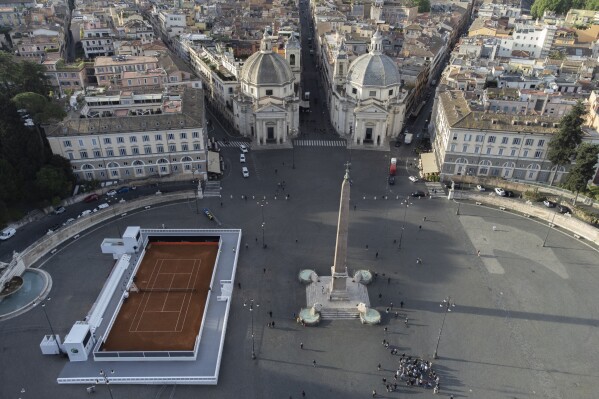 Arial view of a tennis court in Rome's Piazza del Popolo square, Monday, May 6, 2024. The court was set up on the occasion Italian tennis open tournament scheduled to start on Monday at Rome's Foro Italico. (AP Photo/Alessandra Tarantino)