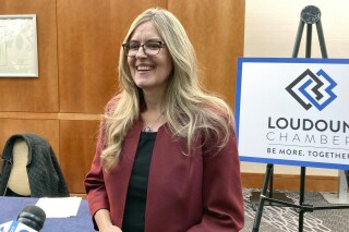 FILE - Rep. Jennifer Wexton, D-Va., speaks with reporters, Oct. 20, 2022, in Leesburg, Va. Wexton announced Monday, Sept. 18, 2023, that she won't seek reelection in her competitive district in the northern Virginia suburbs of Washington after learning she has a severe form of Parkinson's disease. (AP Photo/Matthew Barakat, File)