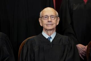 FILE - In this April 23, 2021, file photo, Supreme Court Associate Justice Stephen Breyer sits during a group photo at the Supreme Court in Washington. Breyer is talking with the head of the National Constitution Center in Philadelphia and taking questions from students on Friday, May 28. (Erin Schaff/The New York Times via AP, Pool)