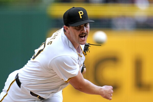 Pittsburgh Pirates starting pitcher Paul Skenes, making his major league debut, delivers during the first inning of a baseball game against the Chicago Cubs in Pittsburgh, Saturday, May 11, 2024. (AP Photo/Gene J. Puskar)