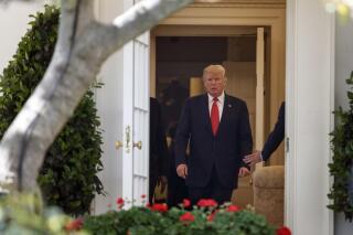 President Donald Trump walks through the Oval Office an his way to a news conference in the Rose Garden of the White House in Washington, Monday, April 30, 2018. In an April 2018 interview NBC News, Dr. Harold Bornstein said that in February 2017, three men, including Keith Schiller, the president’s longtime bodyguard, showed up at the office of president’s former personal doctor to collect the president’s medical records, leaving Bornstein feeling "raped, frightened and sad." He said it felt like a raid. (AP Photo/Carolyn Kaster)