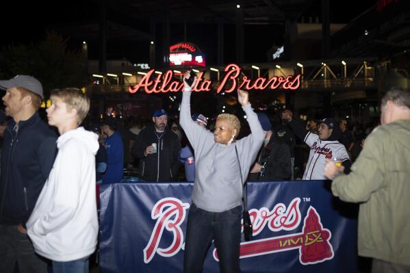 Braves fans celebrate while shopping for World Series m