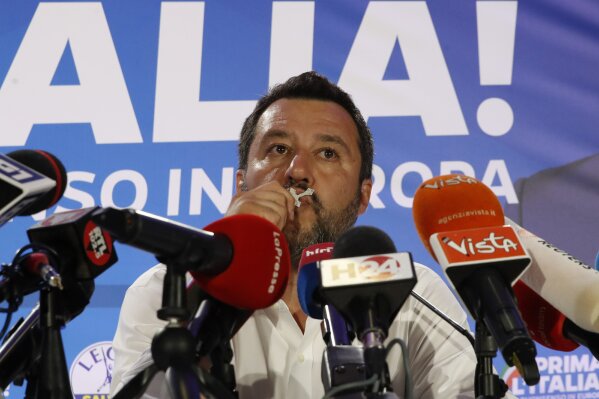 
              Italian Interior Minister and Deputy Premier Matteo Salvini, of the League kisses a crucifix as as he talks to reporters during a press conference at the League headquarters in Milan, Italy, early Monday morning, May 27, 2019. (AP Photo/Antonio Calanni)
            