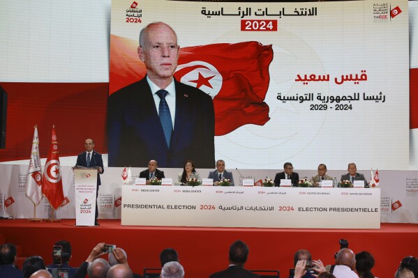 Election officials announce Tunisian president and candidate for re-election Kais Saied as the winner of the presidential elections, in the capital Tunis, Tunisia, Monday, Oct. 7, 2024. (AP Photo/Anis Mili)