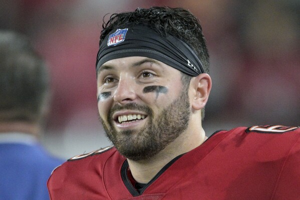 FILE - Tampa Bay Buccaneers quarterback Baker Mayfield reacts during the second half of an NFL wild-card playoff football game against the Philadelphia Eagles, Monday, Jan. 15, 2024, in Tampa, Fla. The Buccaneers won 32-9. Mayfield is a finalist for The Associated Press 2023 Comeback Player of the Year.(AP Photo/Phelan M. Ebenhack, File)