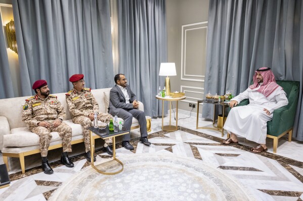 In this photo released by the Saudi government, Saudi Defense Minister Prince Khalid bin Salman, right, meets with a delegation from Yemen's Houthi rebels in Riyadh, Saudi Arabia, Tuesday, Sept. 19, 2023. Saudi Arabia on Wednesday, Sept. 20 praised the "positive results" of talks with Yemen's Houthi rebels after they visited the kingdom for peace talks, though Riyadh released few details on their negotiations to end the war tearing at the Arab world's poorest nation. (Saudi government via AP)