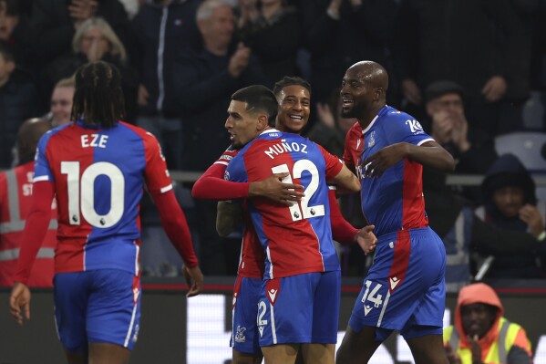 Palace rout demoralized Man United 4-0 in debut of RefCam | AP News