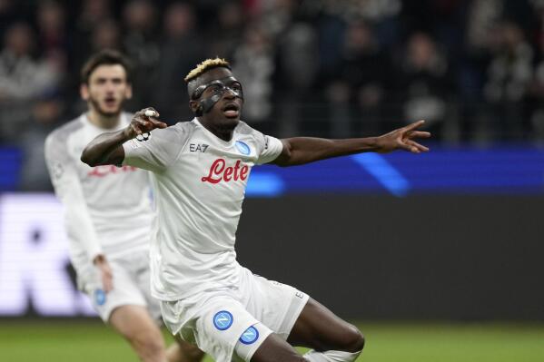Napoli's Victor Osimhen reacts during the Champions League round of 16 second leg soccer match between Eintracht Frankfurt and Napoli, at the Deutsche Bank Arena in Frankfurt, Germany, Tuesday, Feb. 21, 2023. (AP Photo/Michael Probst)