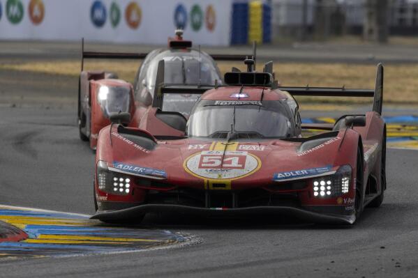 Ferrari AF Corse car driven by Antonio Giovinazzi and Alessandro Pier Guidi from Italy and James Calado from Britain races during the 24-hour Le Mans endurance race in Le Mans, western France, Sunday, June 11, 2023. (AP Photo/Jeremias Gonzales)