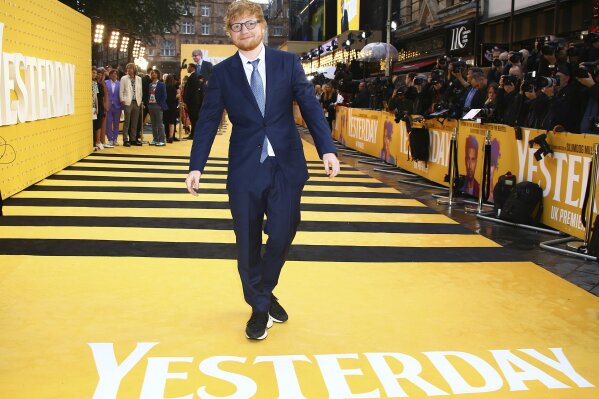 FILE- Singer Ed Sheeran arrives at the premiere of "Yesterday" on June 18, 2019, in London. Sheeran turns 31 on Feb. 17. (Photo by Joel C Ryan/Invision/AP, File)