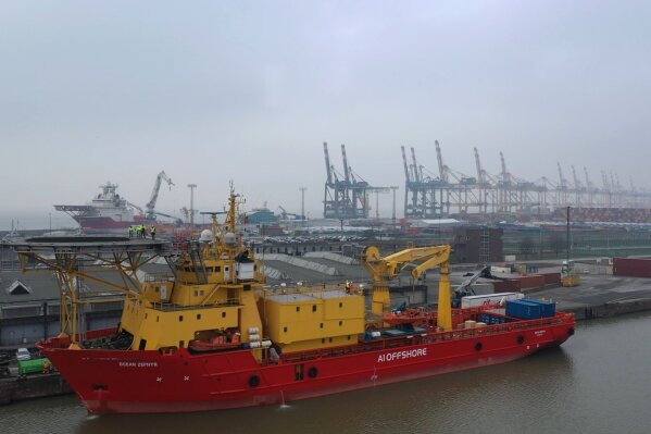 
              In this image taken from drone video, the Ocean Zephyr is docked in Bremerhaven, Germany, Wednesday Jan. 23, 2019. Final preparations were being made Thursday for the start of an unprecedented, years-long mission to explore the Indian Ocean, during which scientists hope to document changes taking place beneath the waves that could affect billions of people in the surrounding region over the coming decades. The Britain-based Nekton Mission will use submarines to go 300 meters below the surface and sonar equipment to survey depths of up to 2,000 meters once the Ocean Zephyr reaches the Seychelles. (AP Photo/Stephen Barker)
            