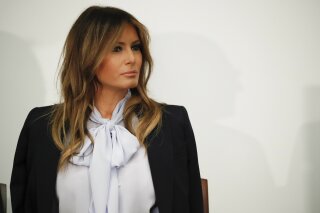 
              First lady Melania Trump attends the 6th Federal Partners in Bullying Prevention (FPBP) Summit at Health and Human Service in Rockville, Md., Monday, Aug. 20, 2018. (AP Photo/Pablo Martinez Monsivais)
            