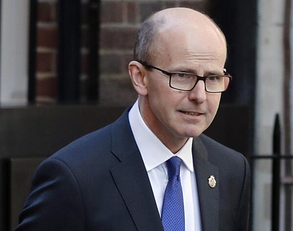 FILE - In this Feb. 14, 2019 file photo, Jeremy Fleming, head of the British Government Communications Headquarters (GCHQ) walks in London. Secret intelligence is playing an unusually public role in the war in Ukraine. Intelligence agencies, especially in the U.S. and Britain, have been remarkably willing to share their assessments of what is happening on the battlefield — and inside the Kremlin.  (AP Photo/Frank Augstein, File)