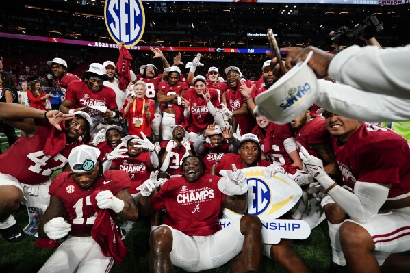 Alabama celebrates after the Southeastern Conference championship NCAA college football game against Georgia in Atlanta, Saturday, Dec. 2, 2023. (AP Photo/Brynn Anderson)