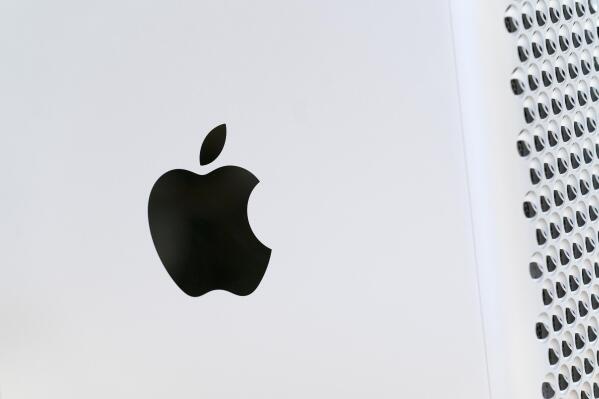 FIE - This May 21, 2021, photo shows the Apple logo displayed on a Mac Pro desktop computer in New York. Apple on Thursday, April 28, 2022, reported quarterly results that topped analysts' projections despite supply shortages, economic fallout from the Russia-Ukraine war and a growth comedown from the huge sales lift that technology products and service got from pandemic restrictions. (AP Photo/Mark Lennihan, File)
