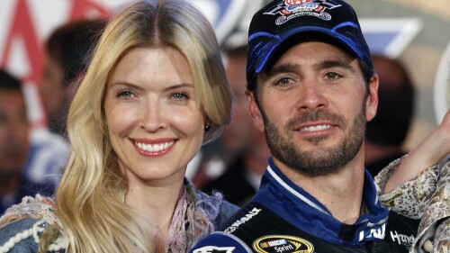 FILE - Jimmie Johnson poses with his wife Chandra Janway in victory lane after his win in a NASCAR Sprint Cup Series auto race at Texas Motor Speedway in Fort Worth, Texas, Nov. 4, 2012. Police in Muskogee, Okla., confirmed Tuesday, June 27, 2023, that they are investigating the deaths of three relatives of seven-time NASCAR champion Johnson as an apparent murder-suicide. A representative for Johnson confirmed the three are the parents and nephew of Johnson's wife, Chandra Janway. (AP Photo/Tim Sharp, File)