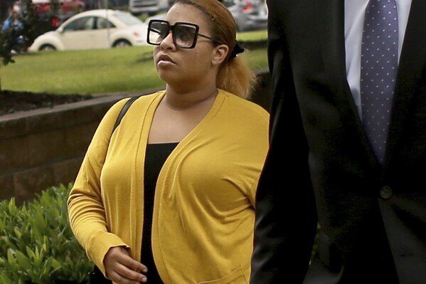 Deja Taylor arrives at federal court, Monday, June 12, 2023, in Virginia Beach, Va. Prosecutors have asked a federal judge to revoke the bond for Taylor, the mother of a Virginia boy who shot and wounded his first-grade teacher, after she allegedly failed multiple drug tests while awaiting sentencing on two felony charges. Taylor pleaded guilty in June to having a gun while possessing marijuana and to lying on a federal background check form when she purchased the 9mm handgun her son used to shoot teacher Abigail Zwerner at the Richneck Elementary School in Newport News. (Stephen M. Katz/The Virginian-Pilot via AP)