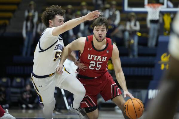 Utah guard Rollie Worster (25) drives against California guard Devin Askew during the first half of an NCAA college basketball game in Berkeley, Calif., Thursday, Dec. 29, 2022. (AP Photo/Godofredo A. Vásquez)