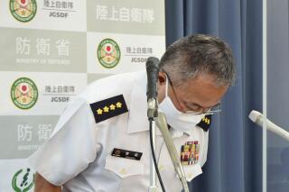 Yoshihide Yoshida, head of Japan’s Ground Self-Defense Force apologize during a news conference in Tokyo Thursday, Sept. 29, 2022. Yoshida apologized to a former soldier for her "pain" because of sexual harassment she was inflicted by a group of servicemembers. (Kyodo News via AP)