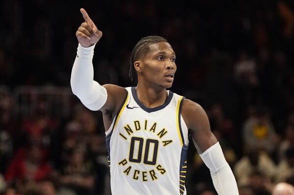 Indiana Pacers guard Bennedict Mathurin (00) reacts to play against the Atlanta Hawks during the first half of an In-Season Tournament NBA basketball game, Tuesday, Nov. 21, 2023, in Atlanta. (AP Photo/Mike Stewart)