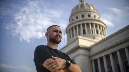 Elian González poses for a portrait in front of the Capitolio in Havana, Cuba, Thursday, June 27, 2023. Twenty three years after González became the center of a dramatic diplomatic custody battle between Cuba and the United States, the young Cuban is now headed to his country’s congress with hopes of representing his people at a time of record migration and heightened tension between the two seaside neighbors. (AP Photo/Ramon Espinosa)