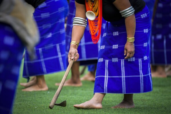 Participants dance during the Hornbill Festival in Kisama, on the outskirts of Kohima, capital of the northeastern Indian state of Nagaland, Tuesday, Dec. 10, 2024. (AP Photo/Anupam Nath)