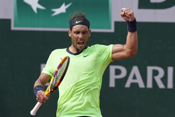 Spain's Rafael Nadal celebrates after defeating Britain's Cameron Norrie during their third round match on day 7, of the French Open tennis tournament at Roland Garros in Paris, France, Saturday, June 5, 2021. (AP Photo/Michel Euler)