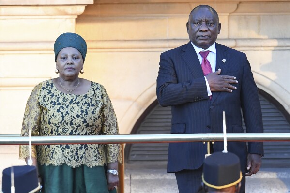 South African President Cyril Ramaphosa gestures while standing next to Speaker of the National Assembly of South Africa Nosiviwe Mapisa-Nqakula ahead of his state of the nation address at the City Hall in Cape Town Thursday, Feb. 8, 2024. (Rodger Bosch/pool photo via 番茄直播)