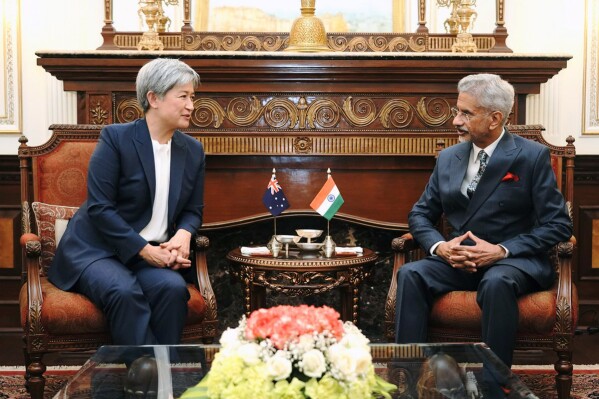 In this photo shared by India's Minister of External Affairs Subramanyam Jaishankar on the X-platform formerly known as Twitter, Australian Foreign Minister Penny Wong, left, and Jaishankar talk during the second India-Australia 2+2 Dialogue in New Delhi, India, Tuesday, Nov.21, 2023. (India's Minister of External Affairs Subramanyam Jaishankar X handle via AP)