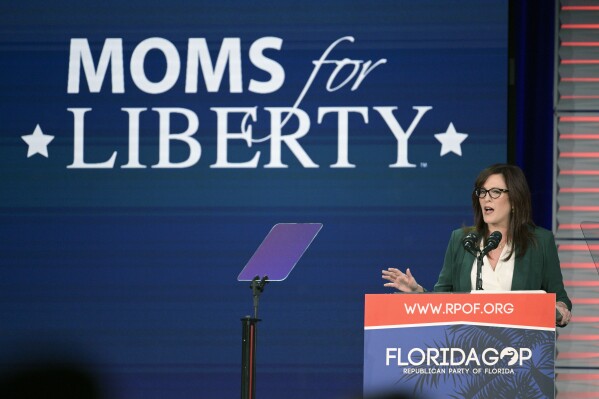 FILE - Moms for Liberty founder Tiffany Justice speaks at the Republican Party of Florida Freedom Summit, Nov. 4, 2023, in Kissimmee, Fla. Moms for Liberty has recently reported $2.1 million in total revenue in 2022. That's more than five times what the conservative 鈥減arental rights鈥� nonprofit made in its inaugural year in 2021, according to tax filing provided to APon Friday. (APPhoto/Phelan M. Ebenhack, File)